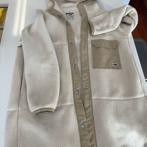 Mid length, fleece jacket like new condition. No marks or stains.